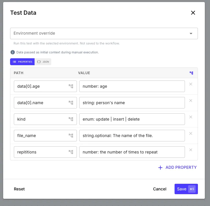 The Test Data dialog for a manual run, pre-seeded with the values defined in the Initial Input Schema and editable as Properties or JSON before pressing Play.
